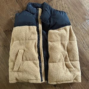 Women’s size small puffer vest.
